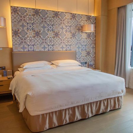 Отель Wyndham Grand Plaza Royale Yuzhou Xiamen Wuyuan Bay Экстерьер фото